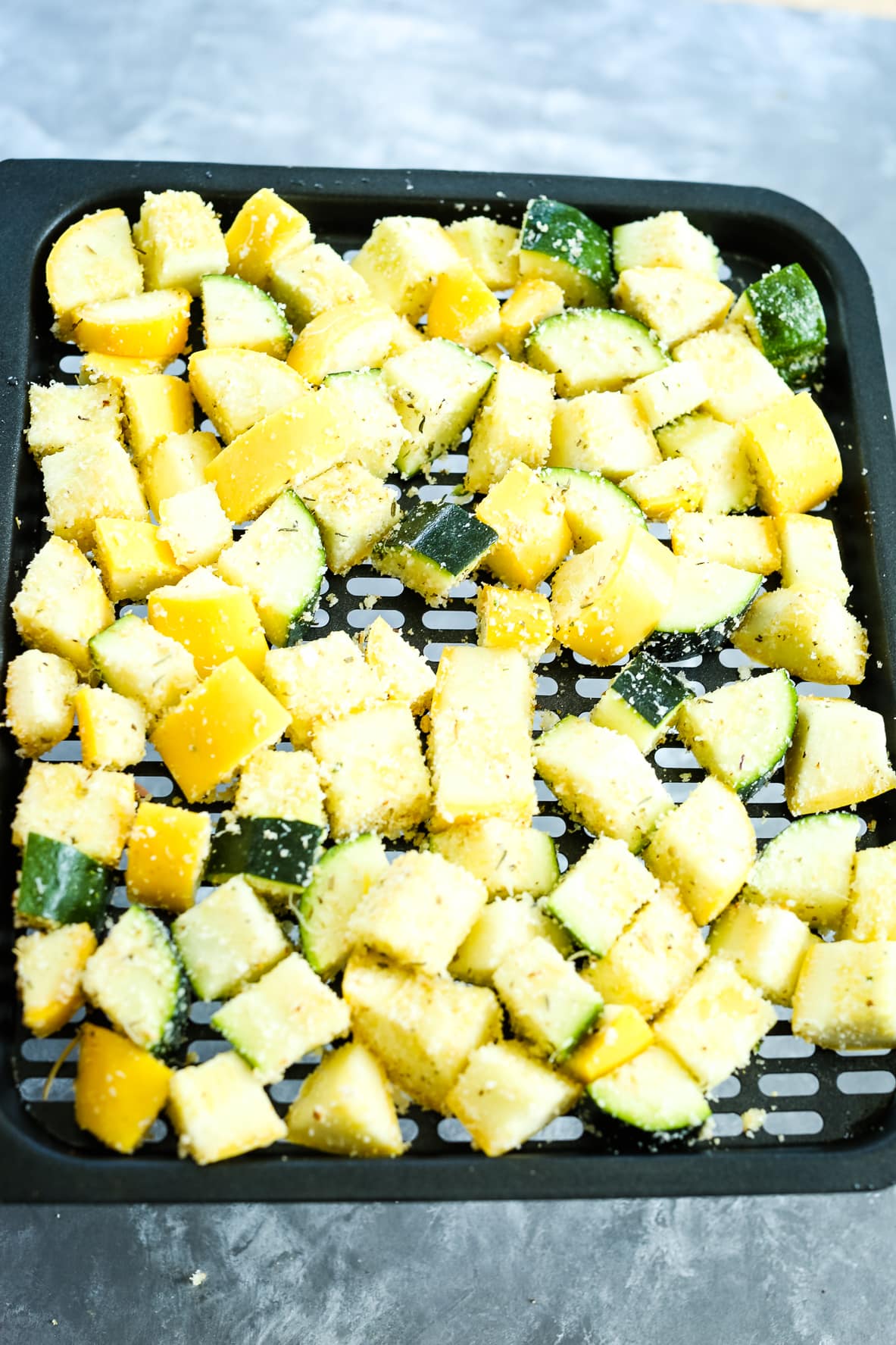 zucchini and squash on a tray for air fryer