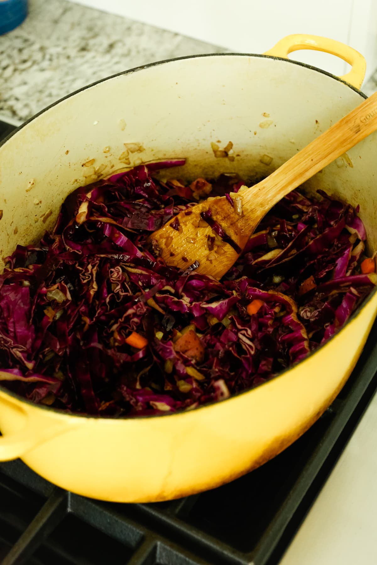 red cabbage in a yellow Dutch oven