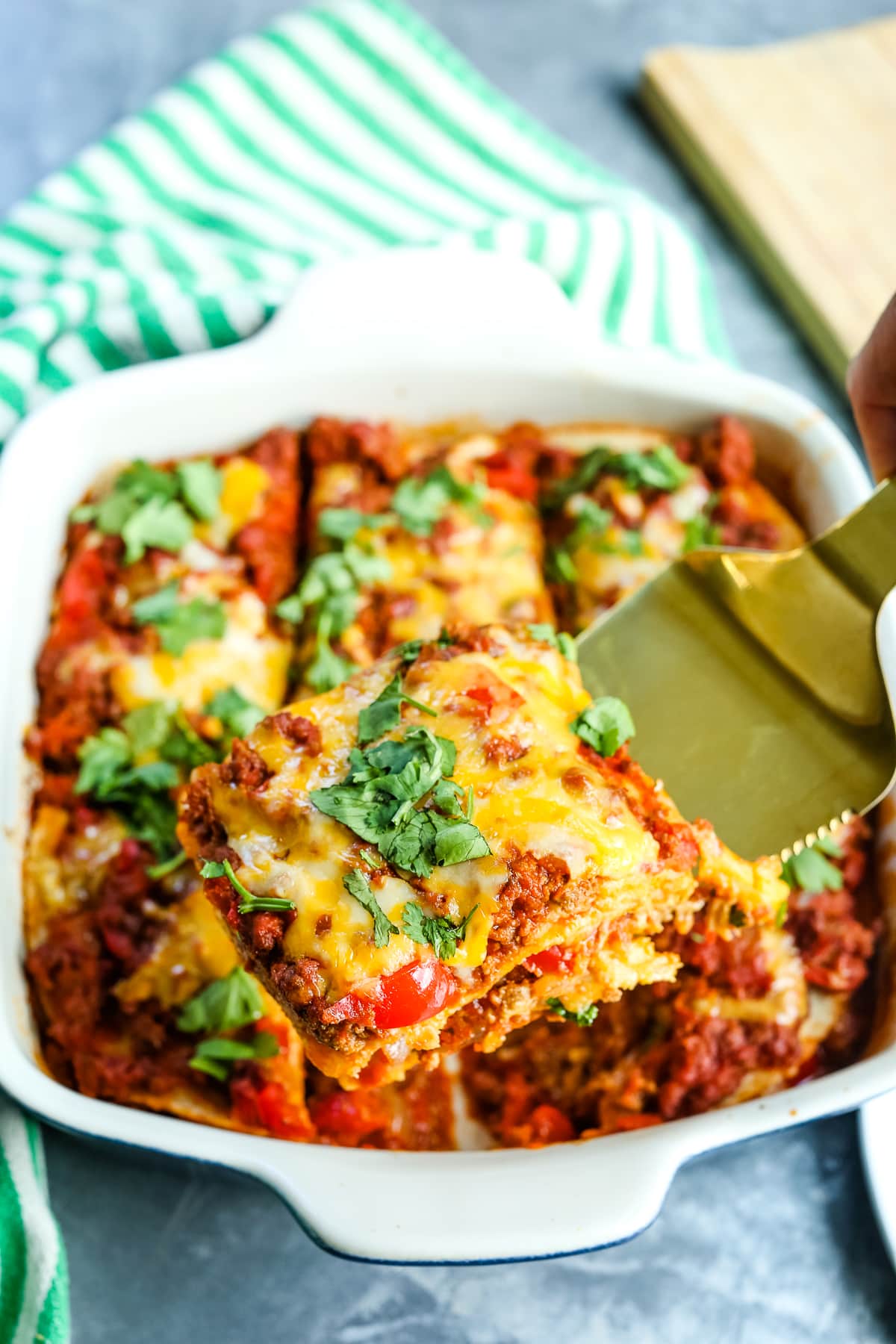 Taco Casserole in a dish being served with a spatula