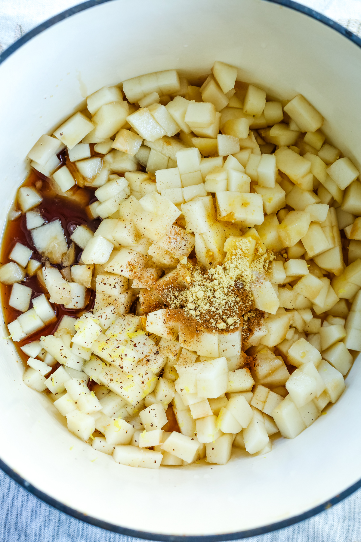 diced pears, spices, and maple syrup in a large saucepan