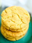 close up photo of a stack of cookies on a green plate