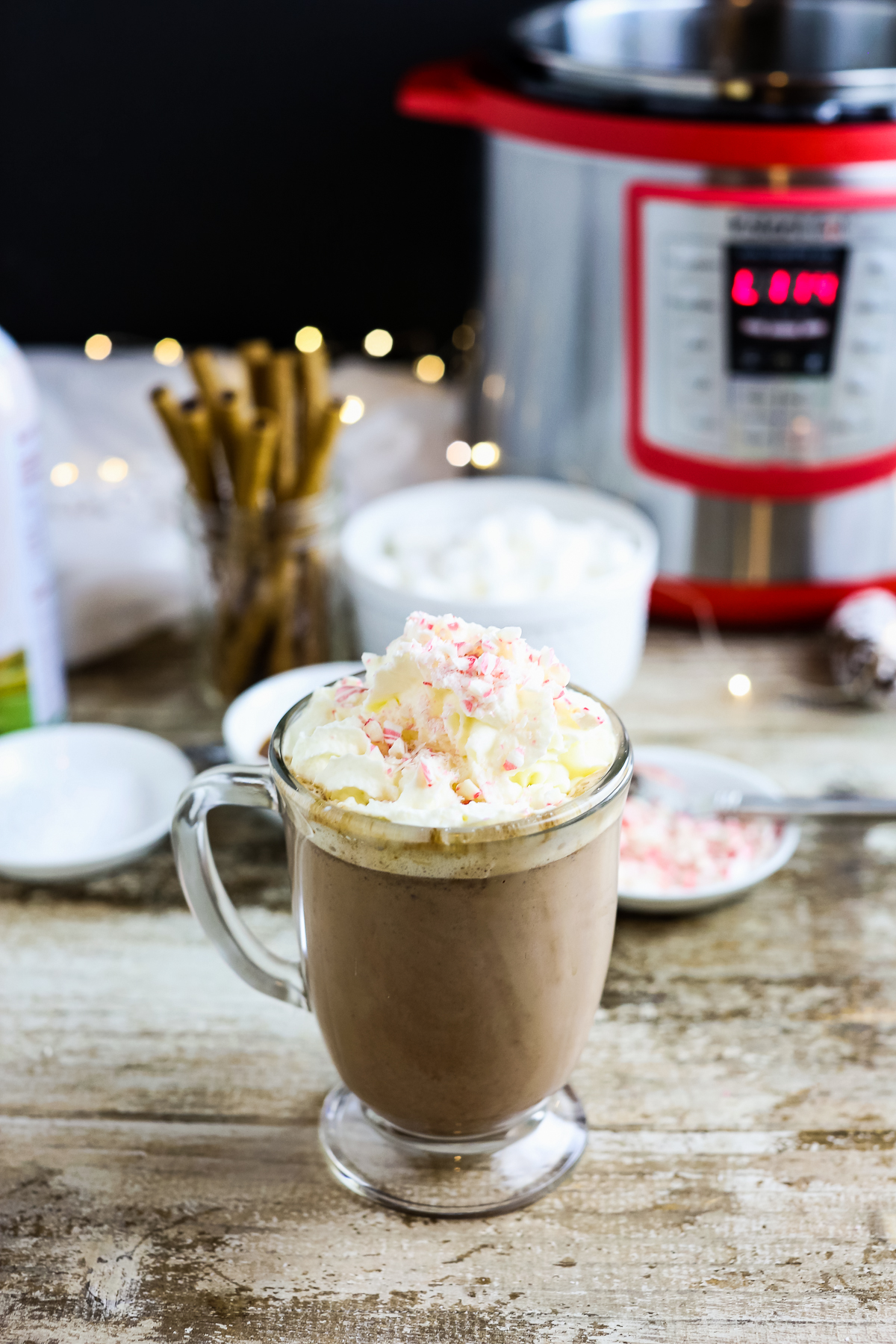 hot chocolate with whipped cream and crushed peppermint