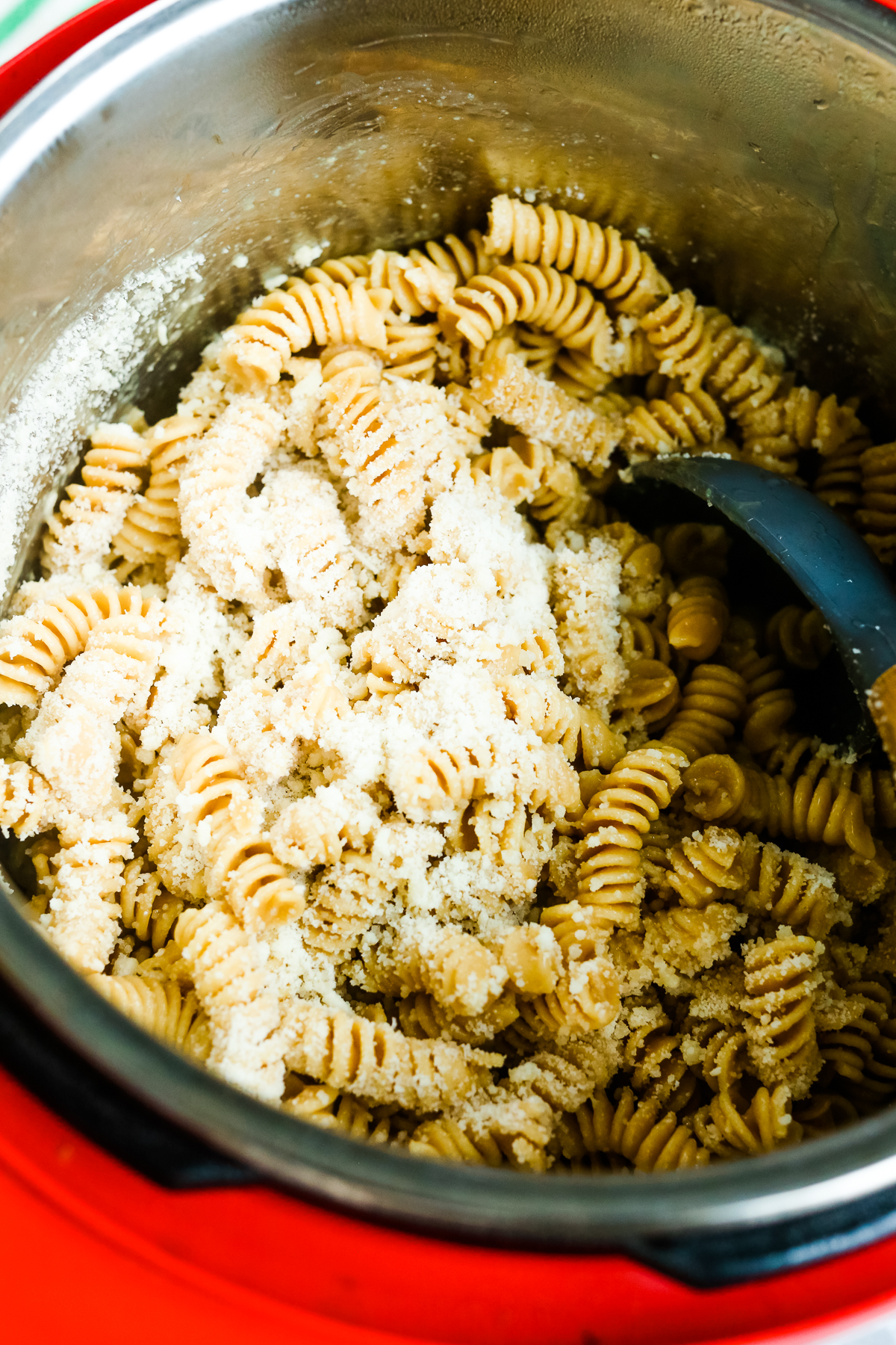 stirring in parmesan cheese to instant pot pasta