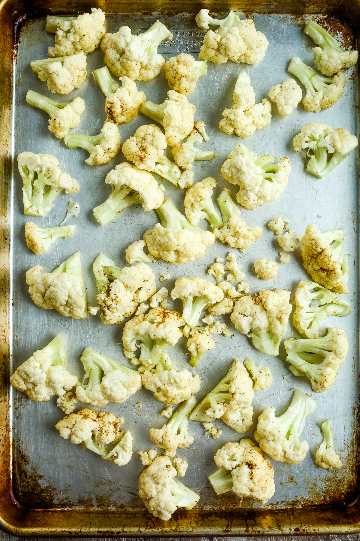 a tray of raw cauliflower florets