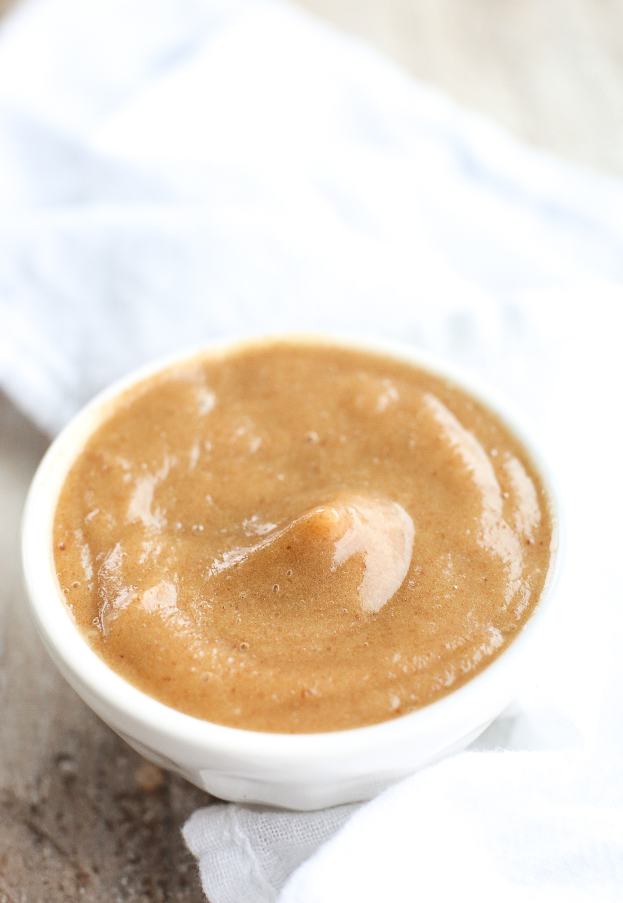 vegan caramel sauce in a white bowl