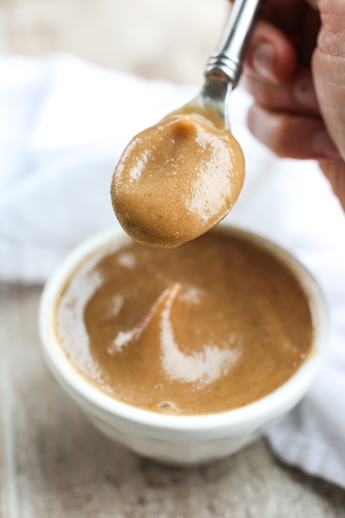 A spoonful of vegan caramel sauce