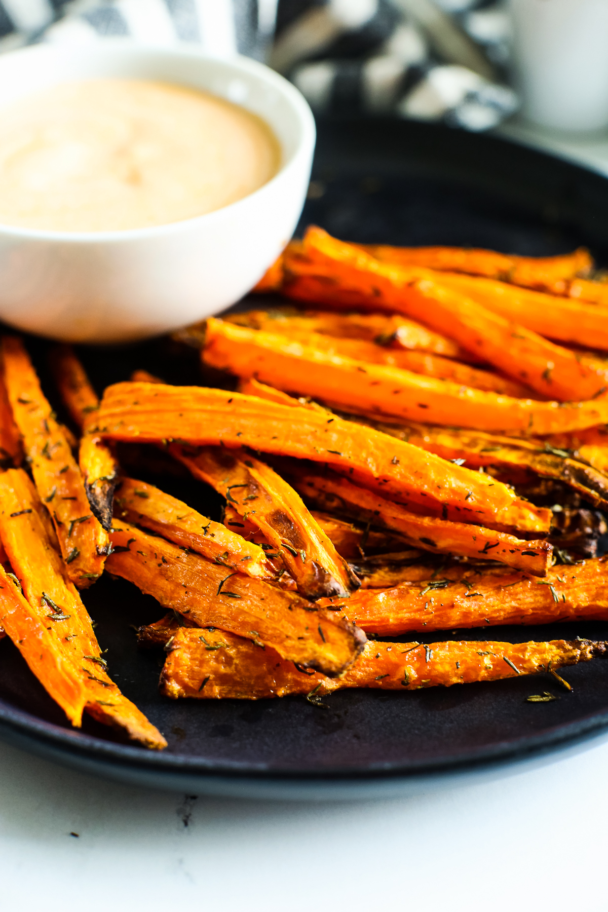 Air fryer carrots on a black plate