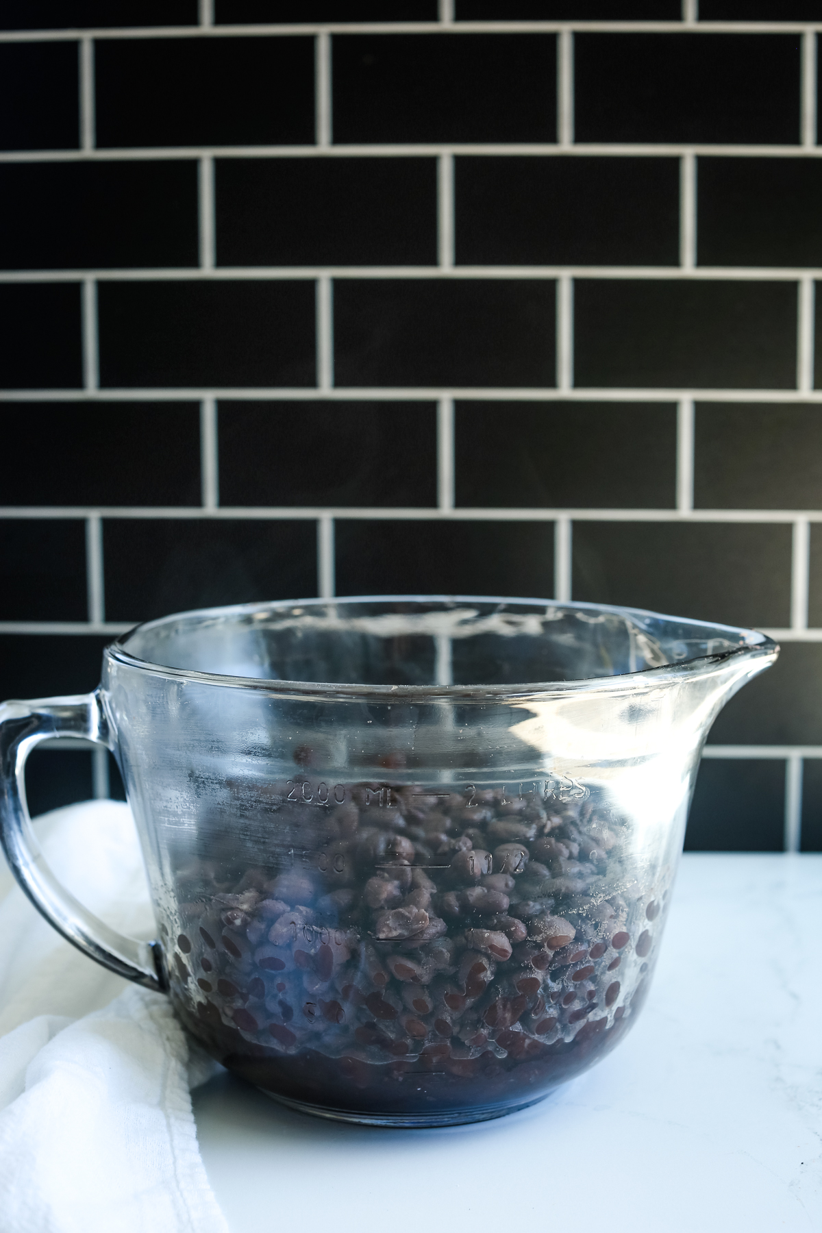 black beans in a large glass measuring cup