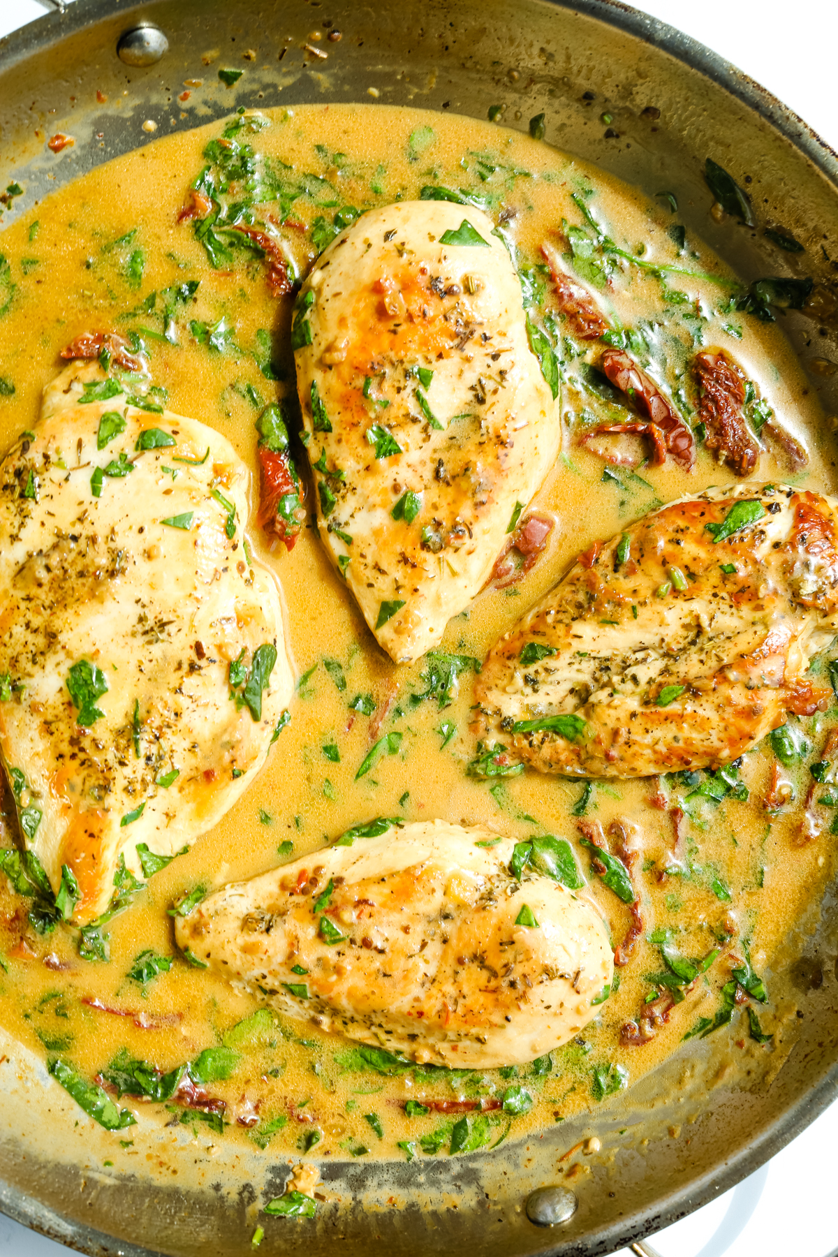 Dairy Free Tuscan Chicken in a pan with sauce