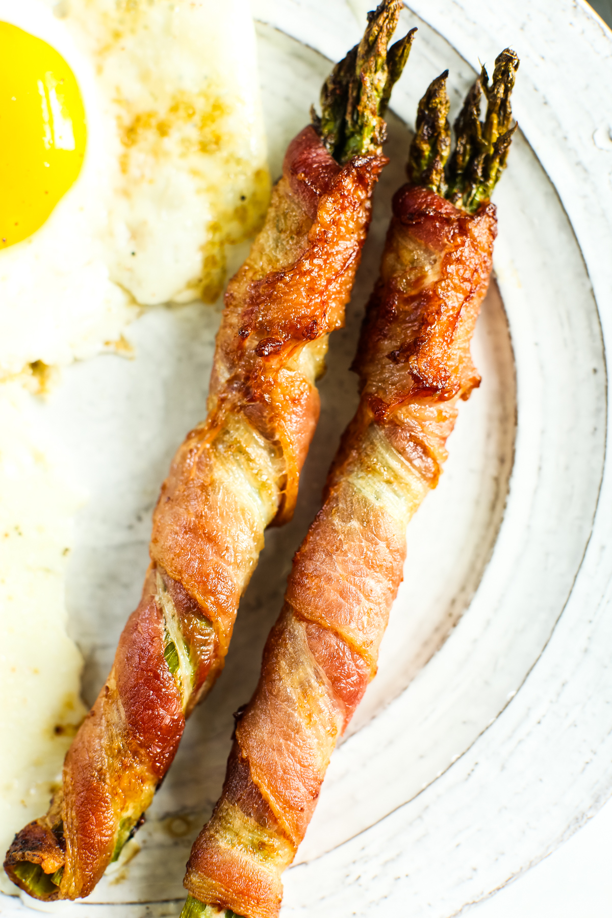 close up shot of air fryer bacon wrapper asparagus