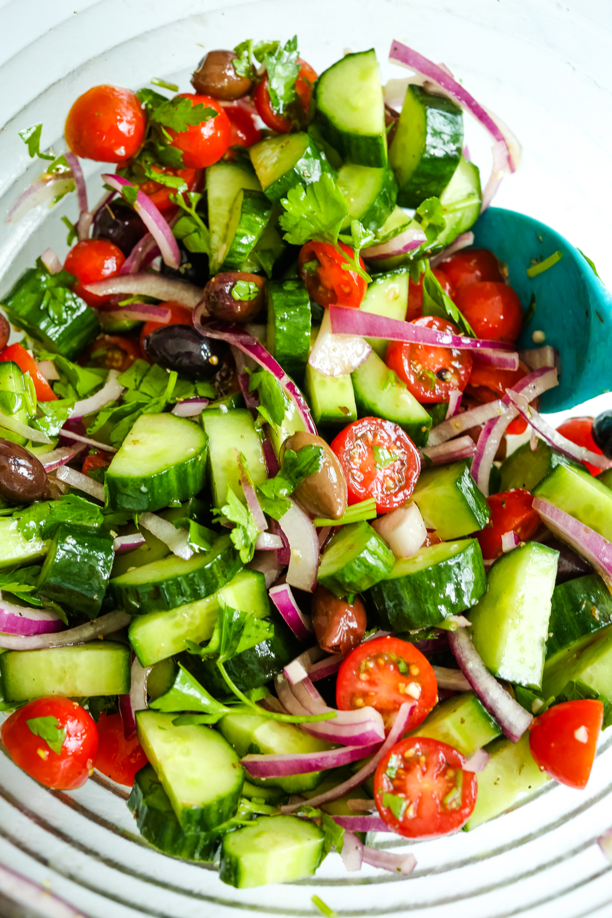grapes, onion, parsley, and tomatoes in a bowl