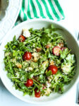 Arugula Quinoa Salad in a white bowl