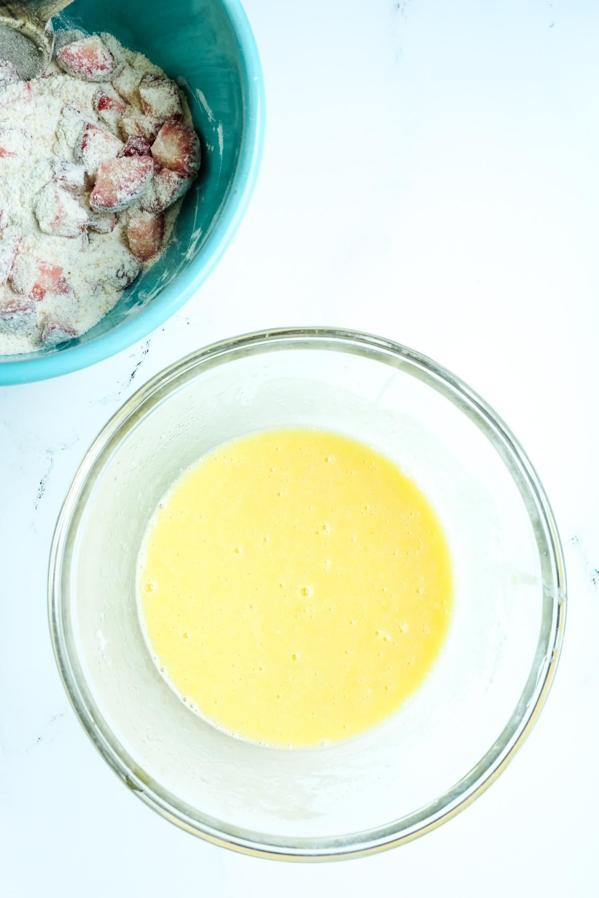 wet ingredients in a clear glass bowl