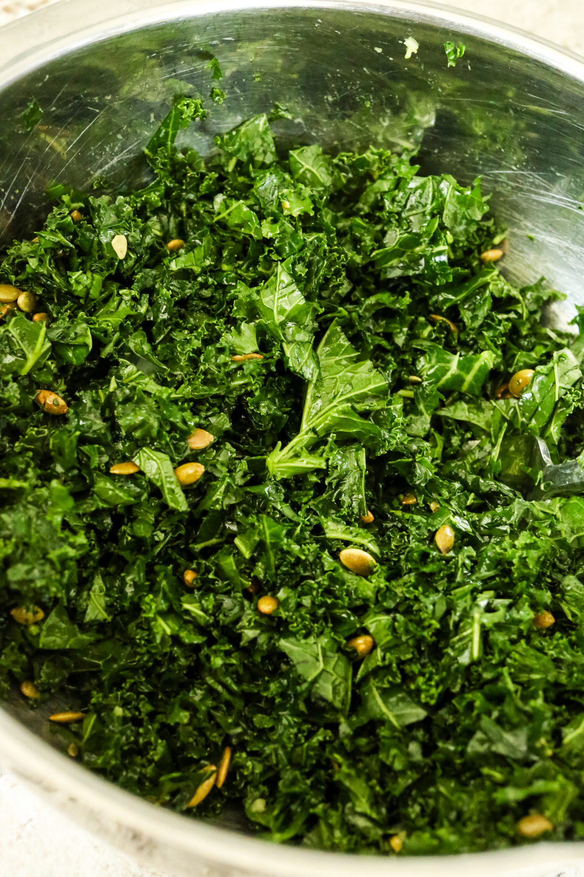 kale and pepitas in a bowl