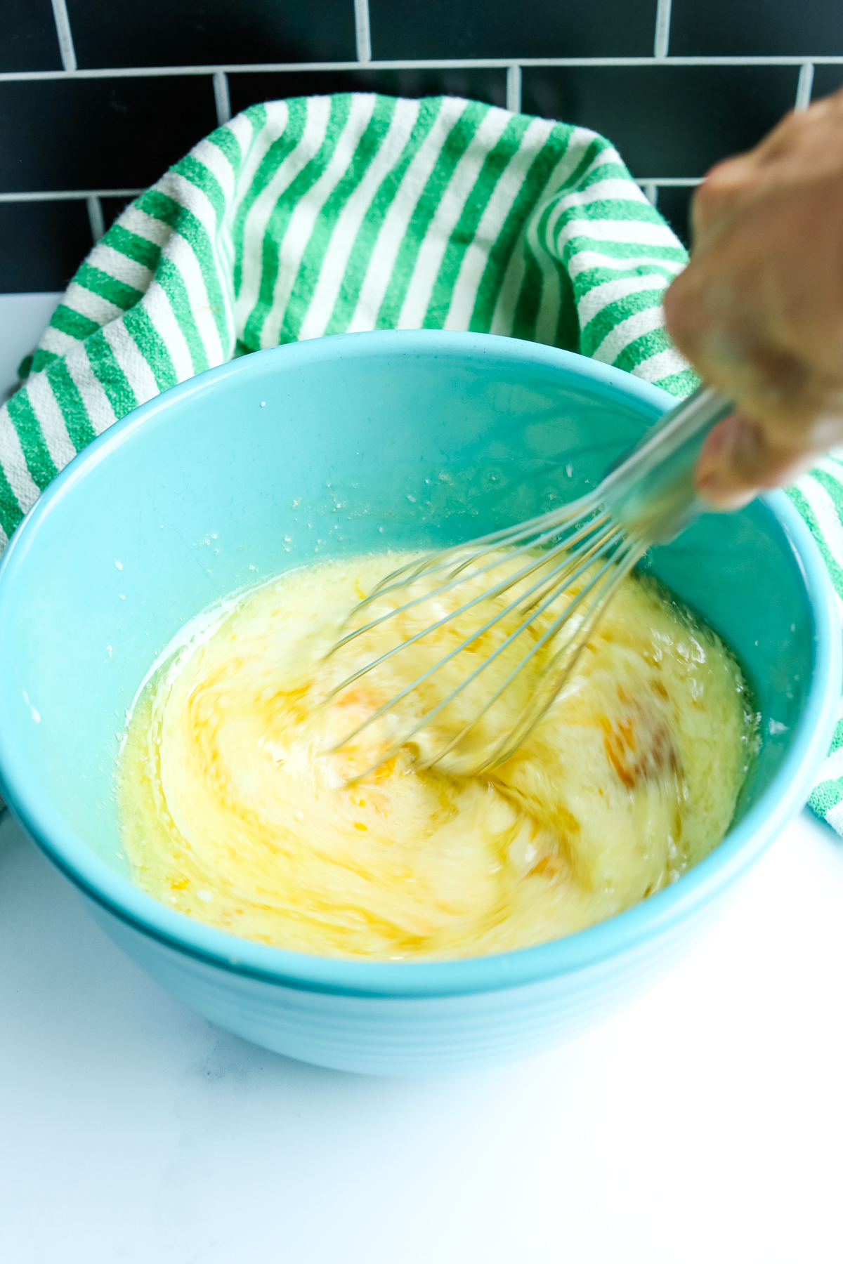 whisking together the wet ingredients