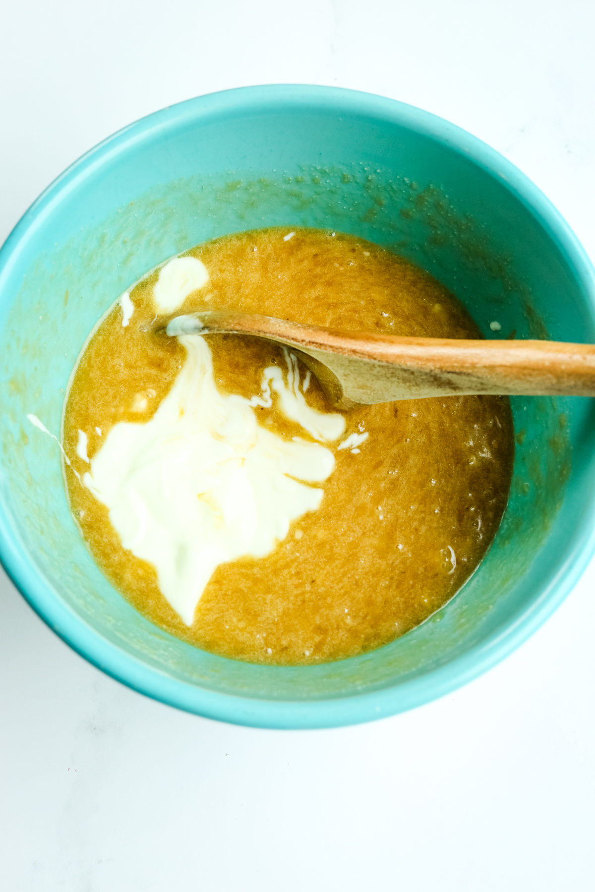 yogurt with banana mixture in a blue bowl