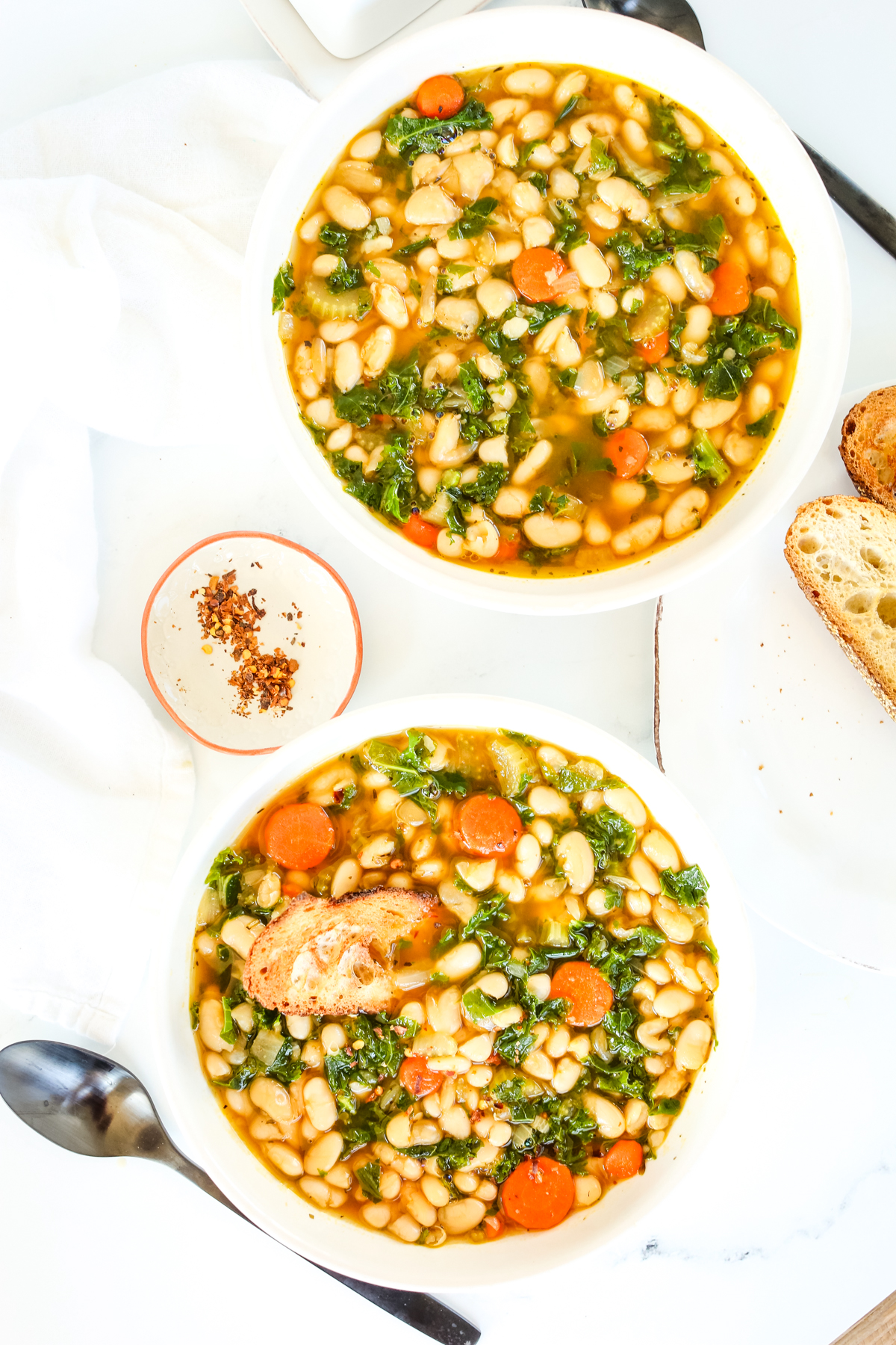 two bowls of soup overhead shot
