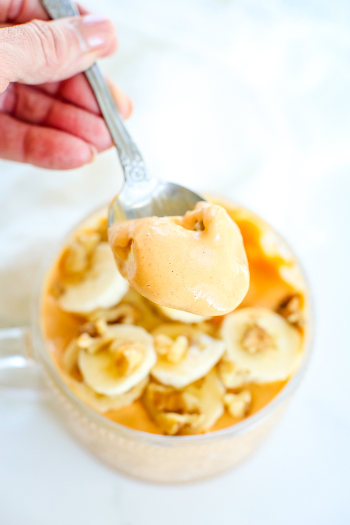 a orange pudding-like mixture on a spoon