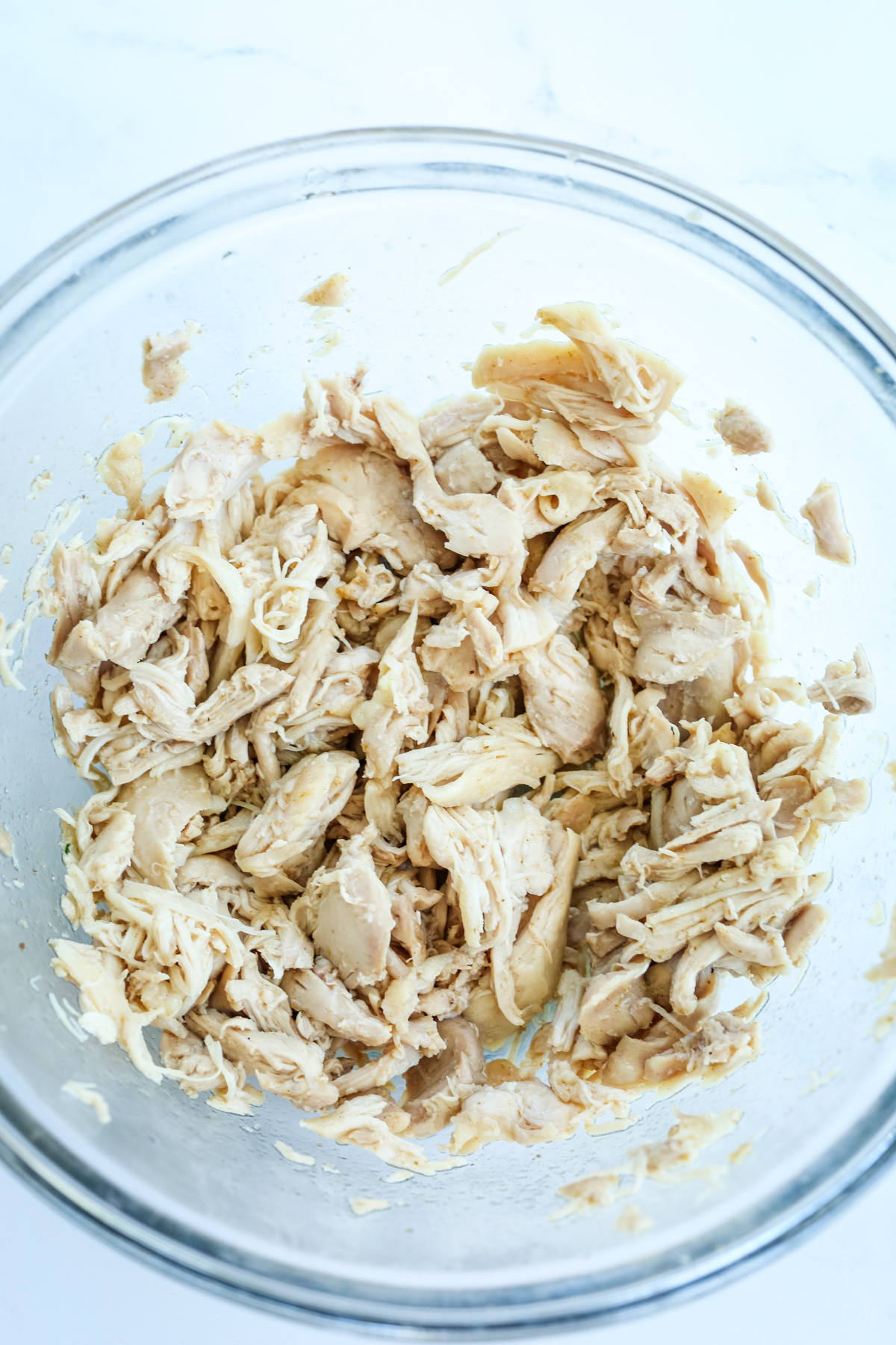 a bowl of shredded chicken