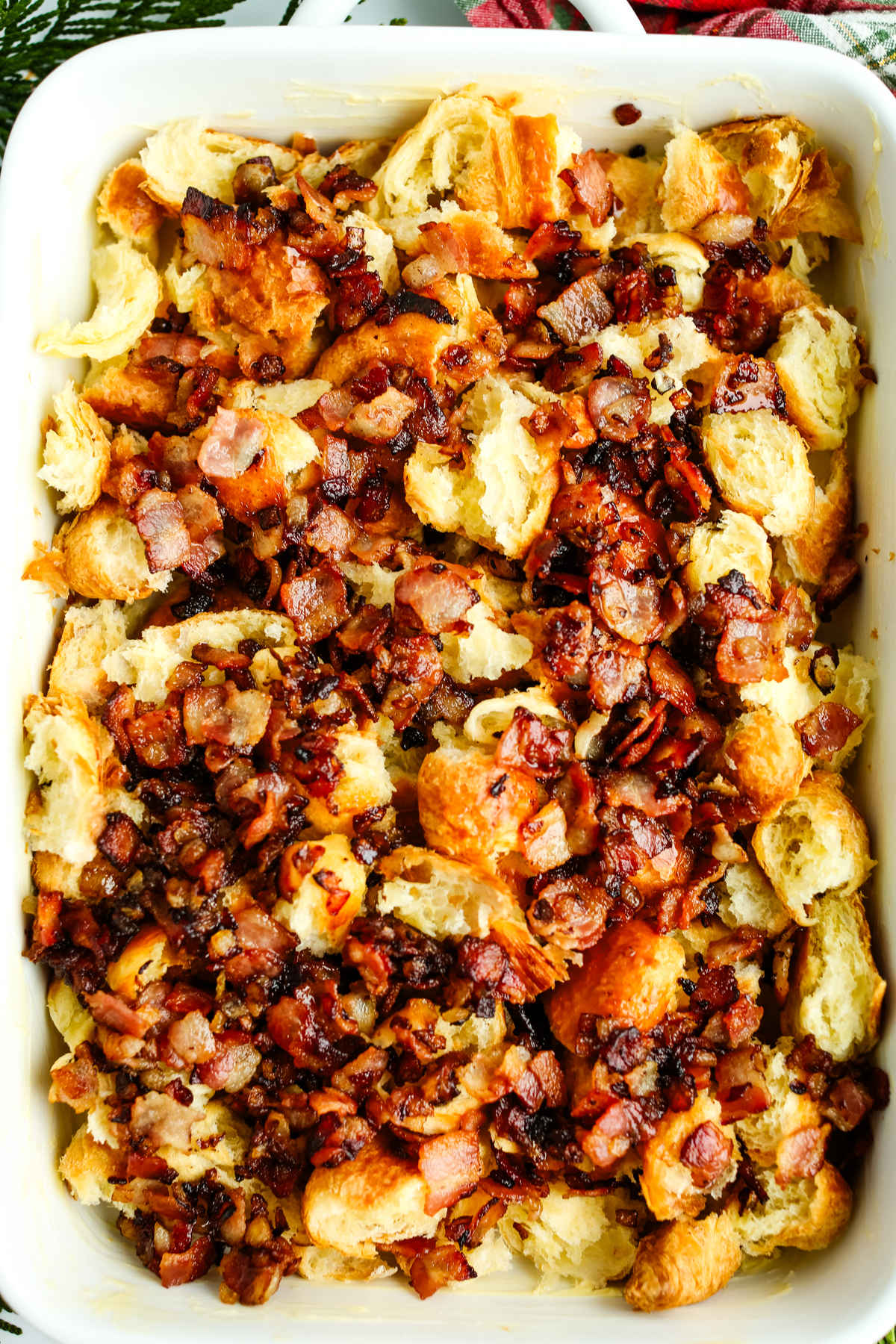 bacon an onions on top of croissants 