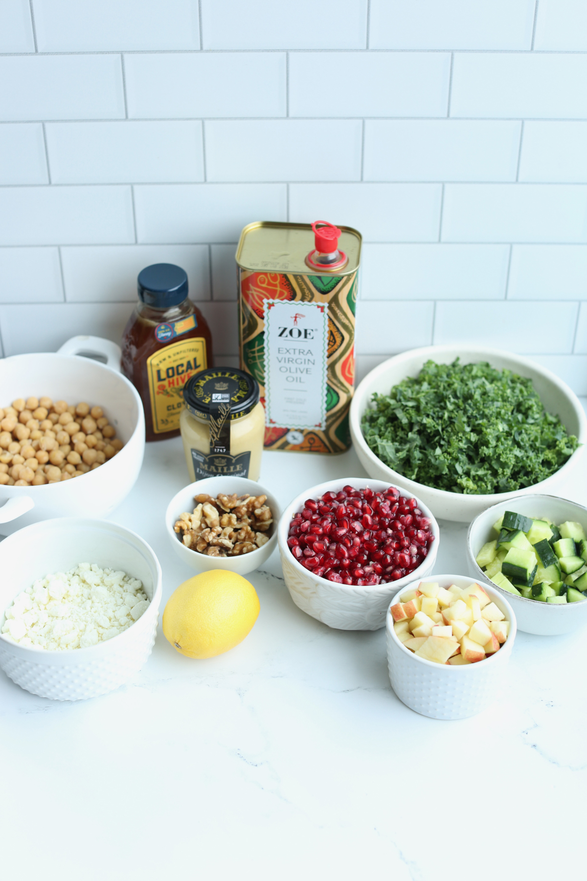 individual recipe ingredients spread out for winter Kale salad