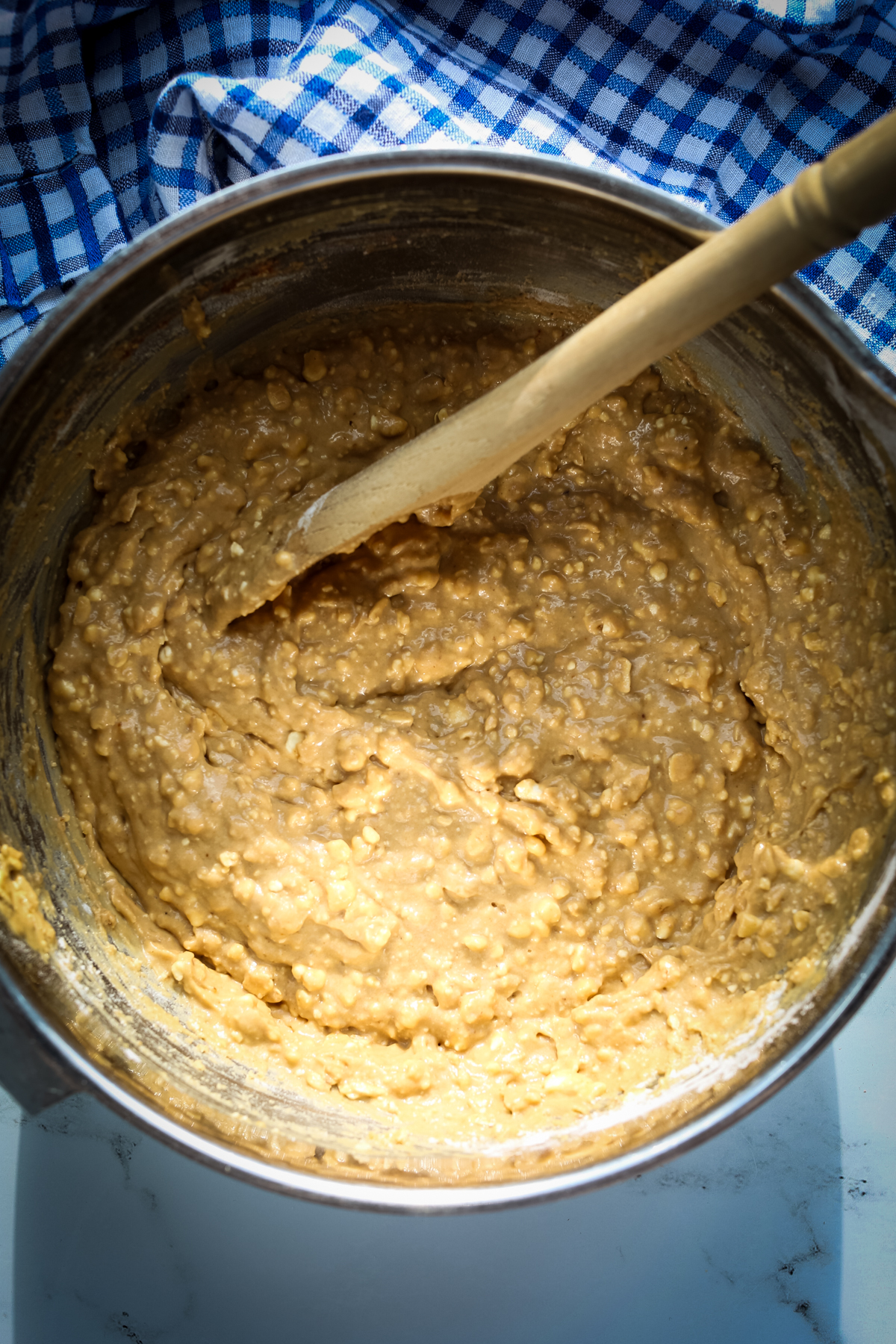 muffin batter with a wooden spoon