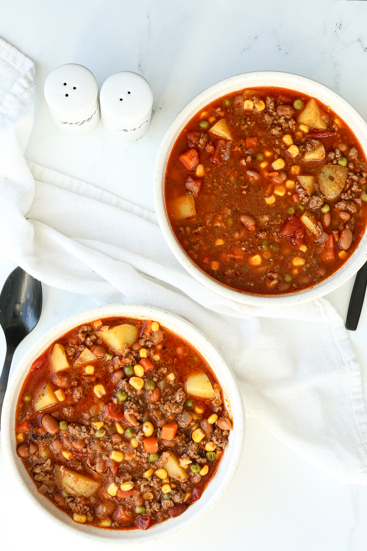 two bowls of soup on the table