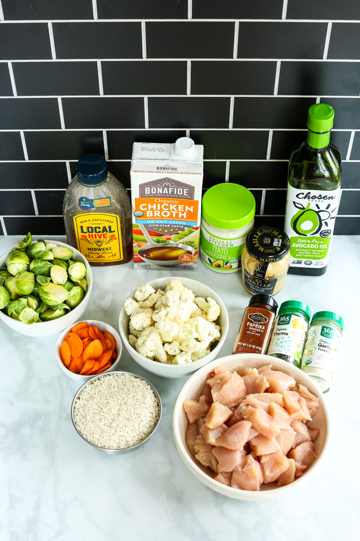 ingredients for chicken and rice bowl all in separate bowls, etc 