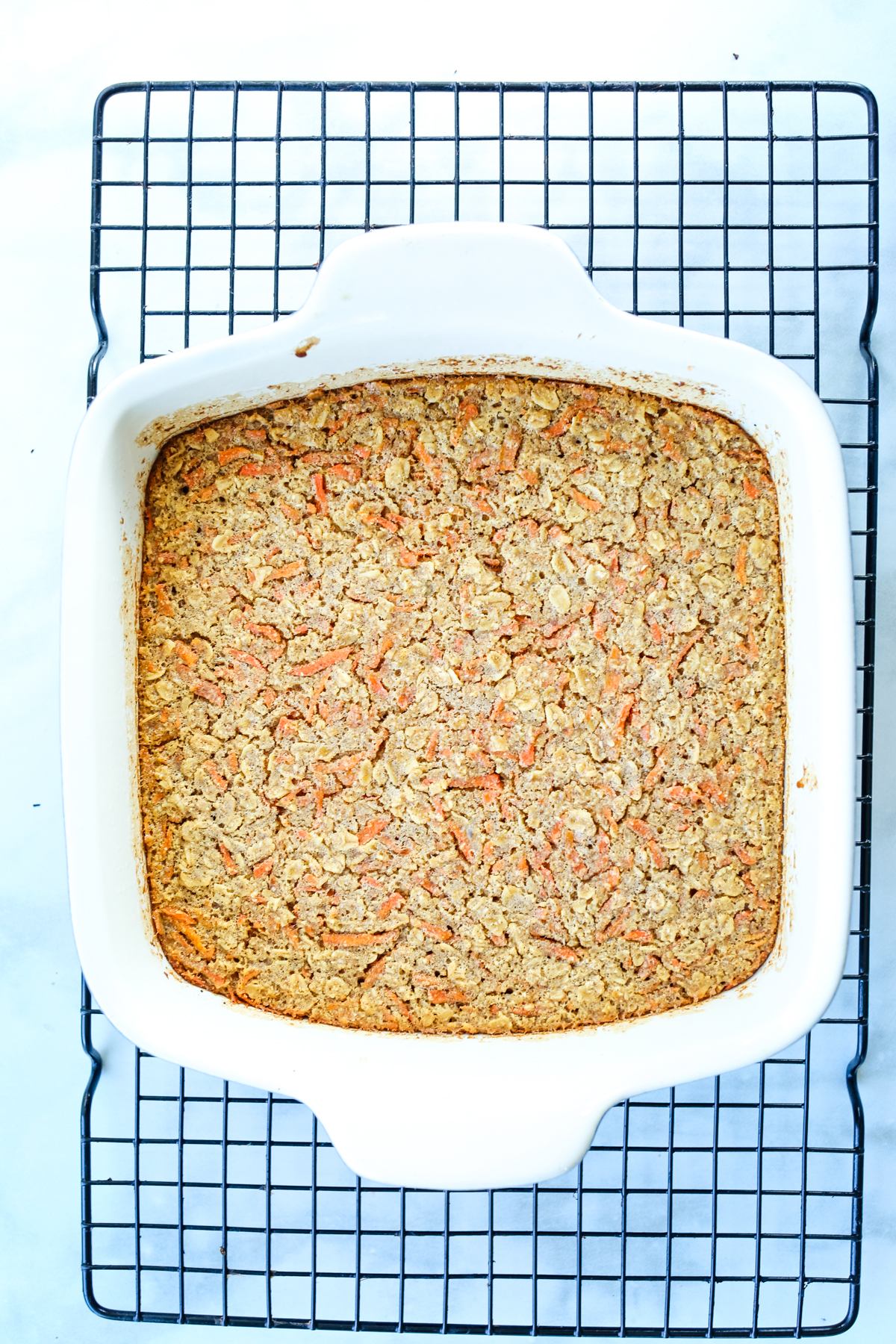 baked oats cooling on a baking sheet