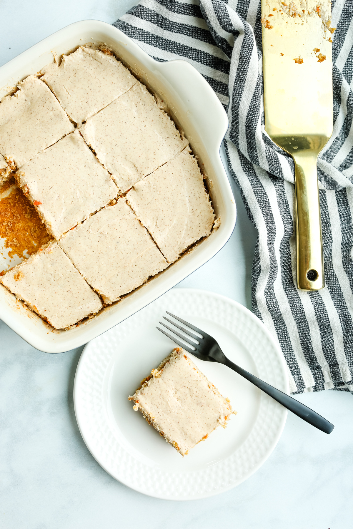 an overhead shot of a pan of bars with one removed on a plate