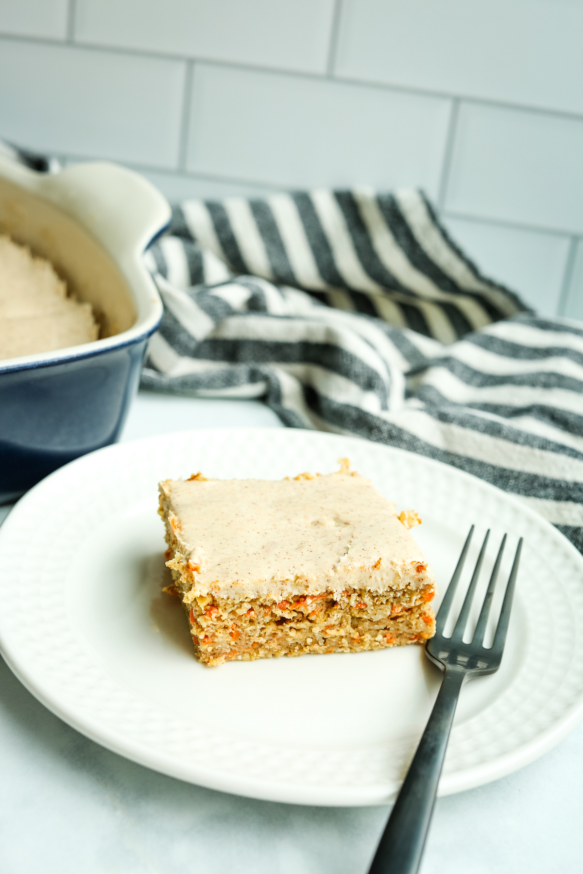 a bar from carrot cake baked oats on a plate