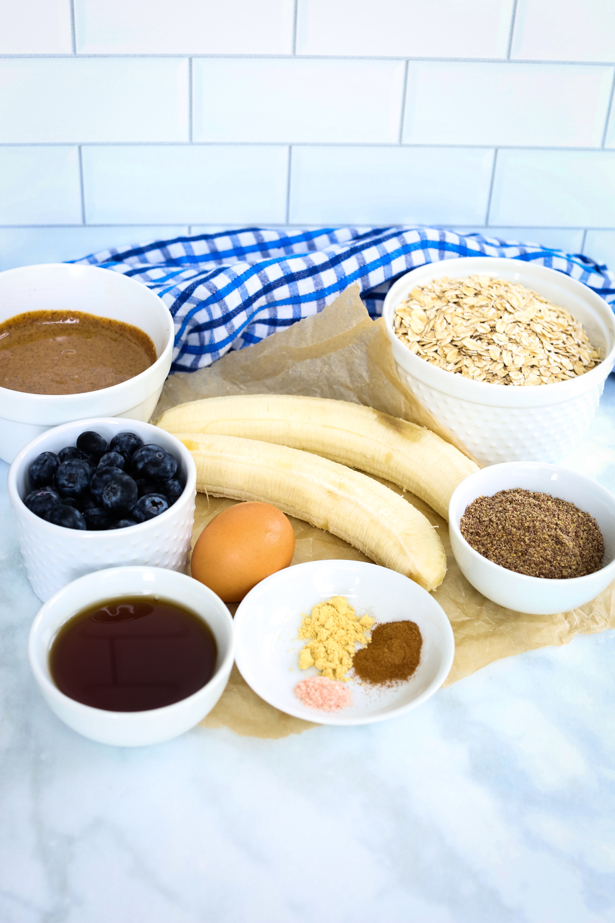 recipe ingredients for blueberry cookies in bowls 