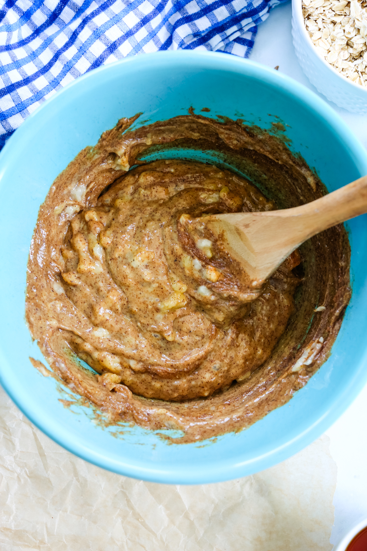 batter being mixed in a blue bowl 