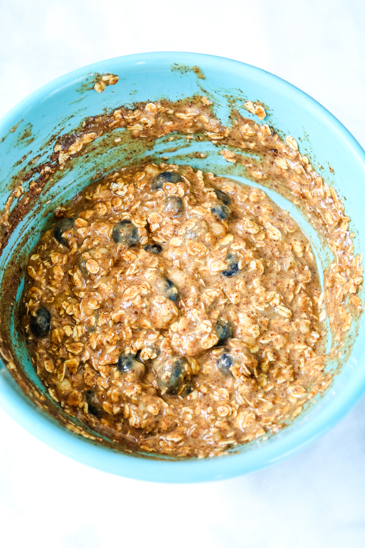 batter with oats in a mixing bowl