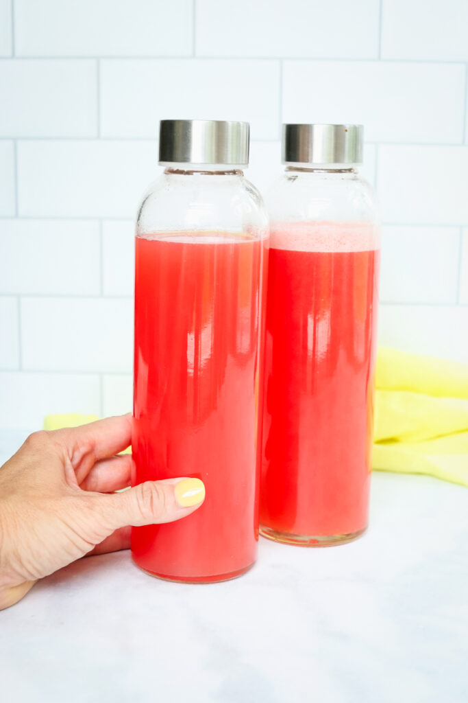 Homemade Electrolyte Drink in two glass bottles