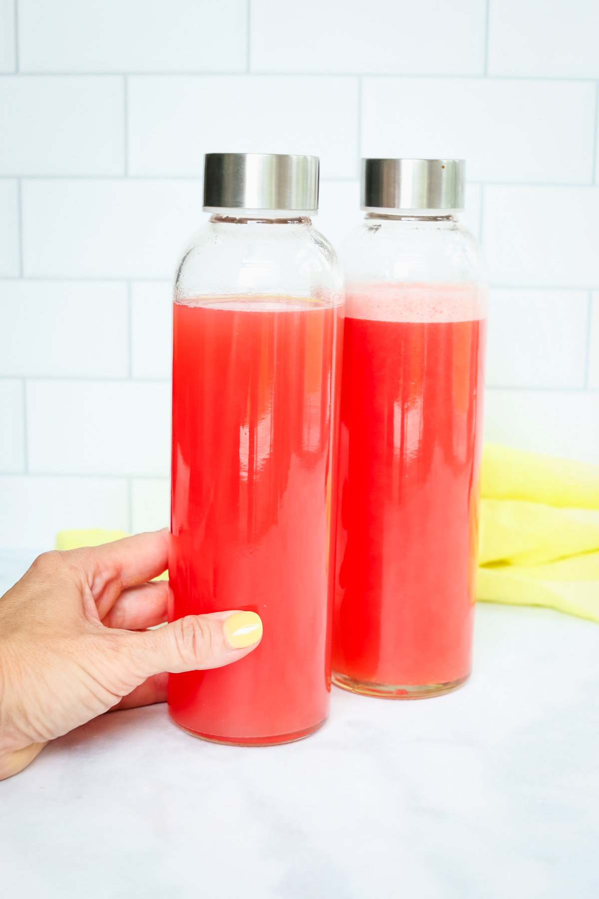 Homemade Electrolyte Drink in two glass bottles