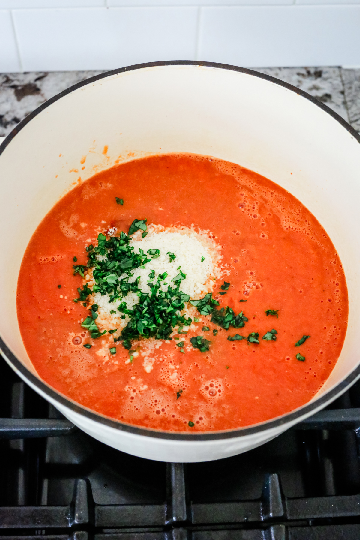 soup ingredients in a pot before stirring to combine