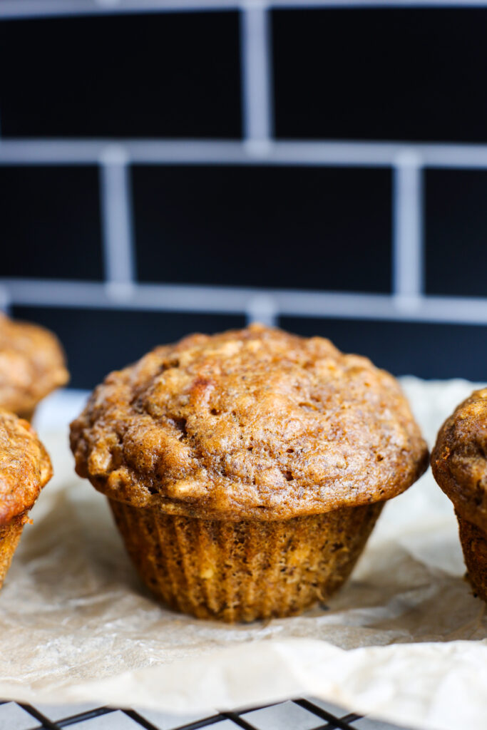 a close up shot of one of the pumpkin protein muffins