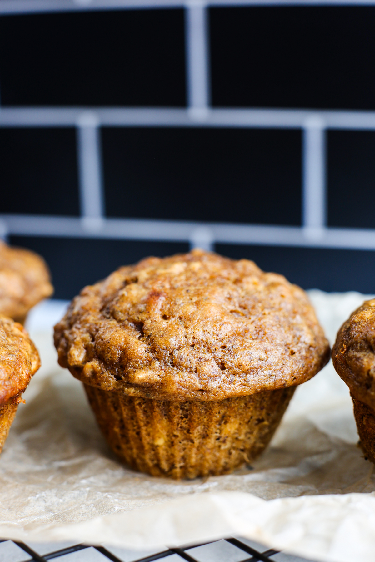 a close up shot of one of the pumpkin protein muffins
