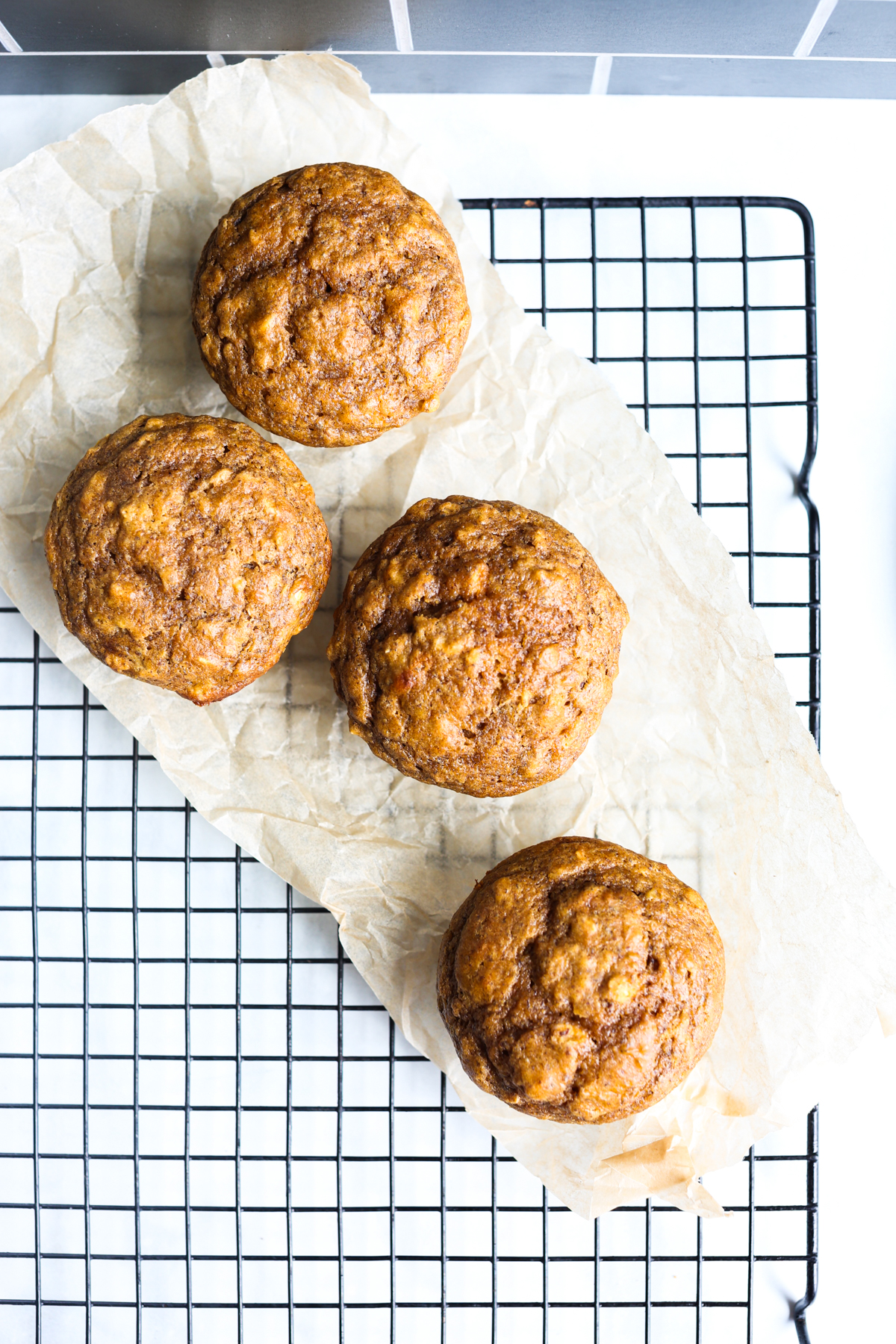 pumpkin protein muffins on a baking tray 