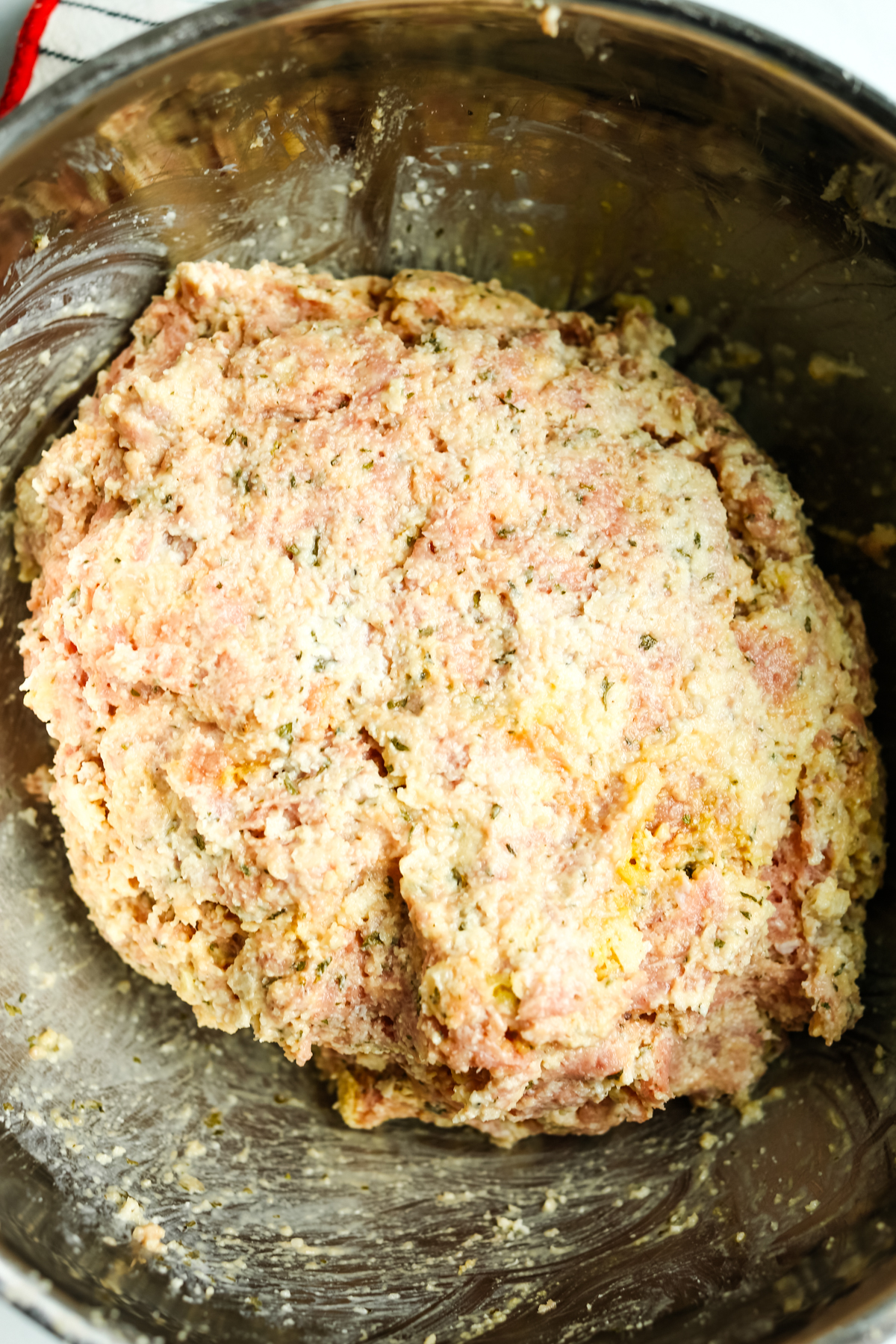 meat mixture in a silver bowl