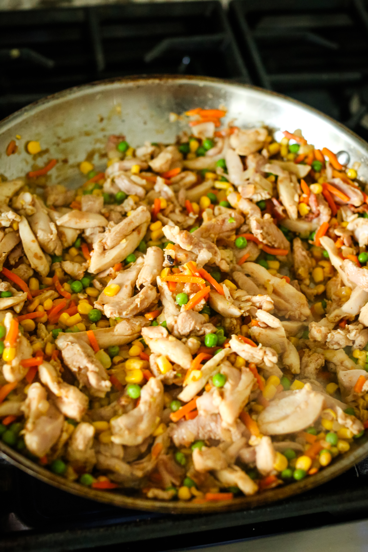 chicken and vegetables in a large skillet