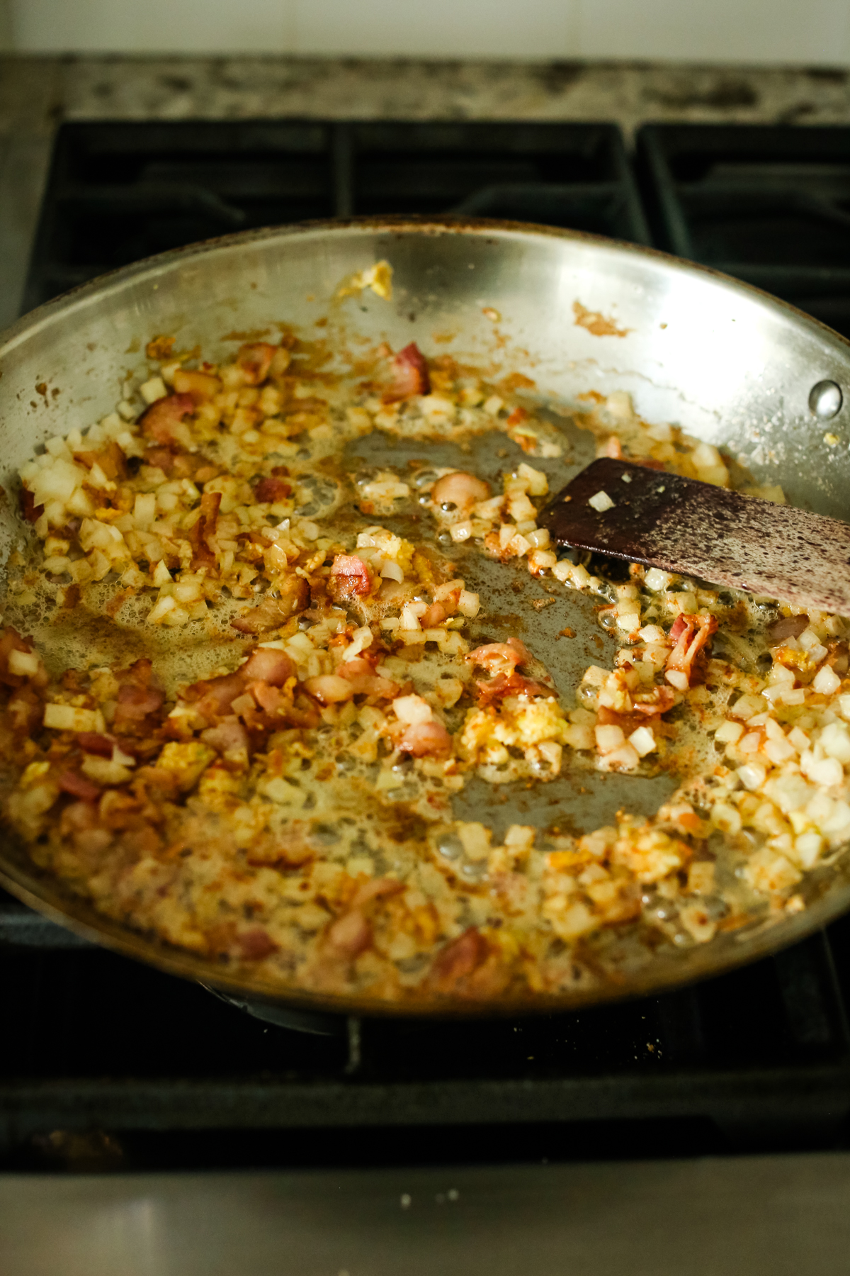 bacon and onion in a large skillet