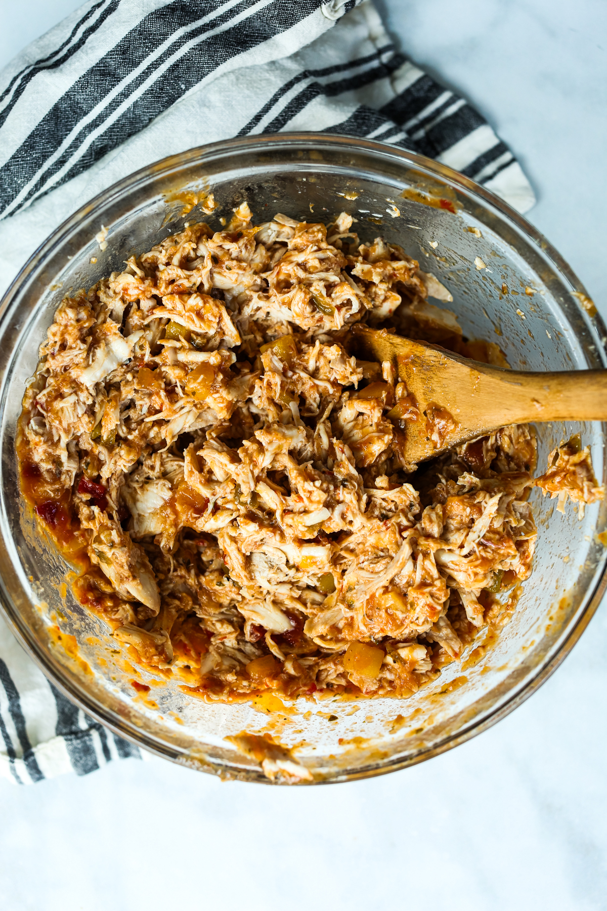 chicken and salsa combined in a glass bowl