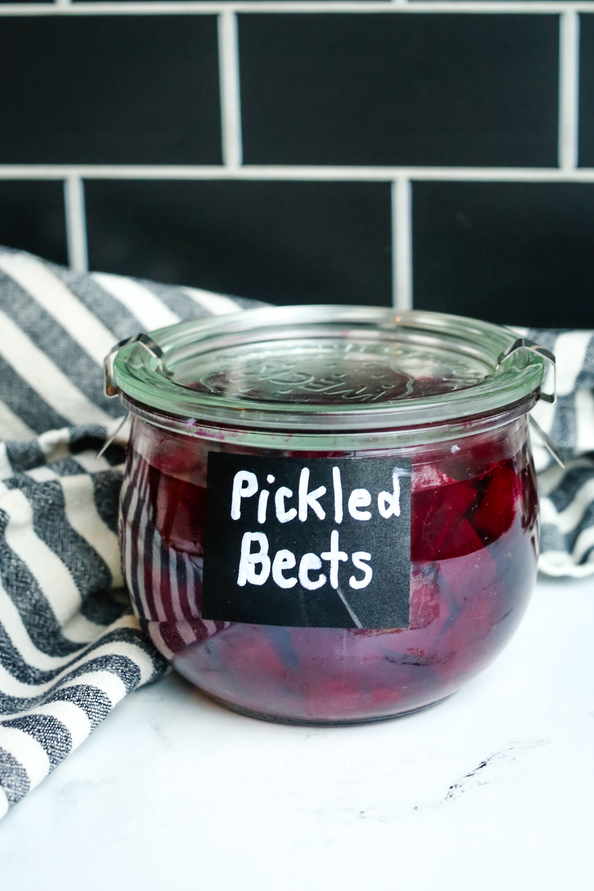 pickled beets in a jar with a label
