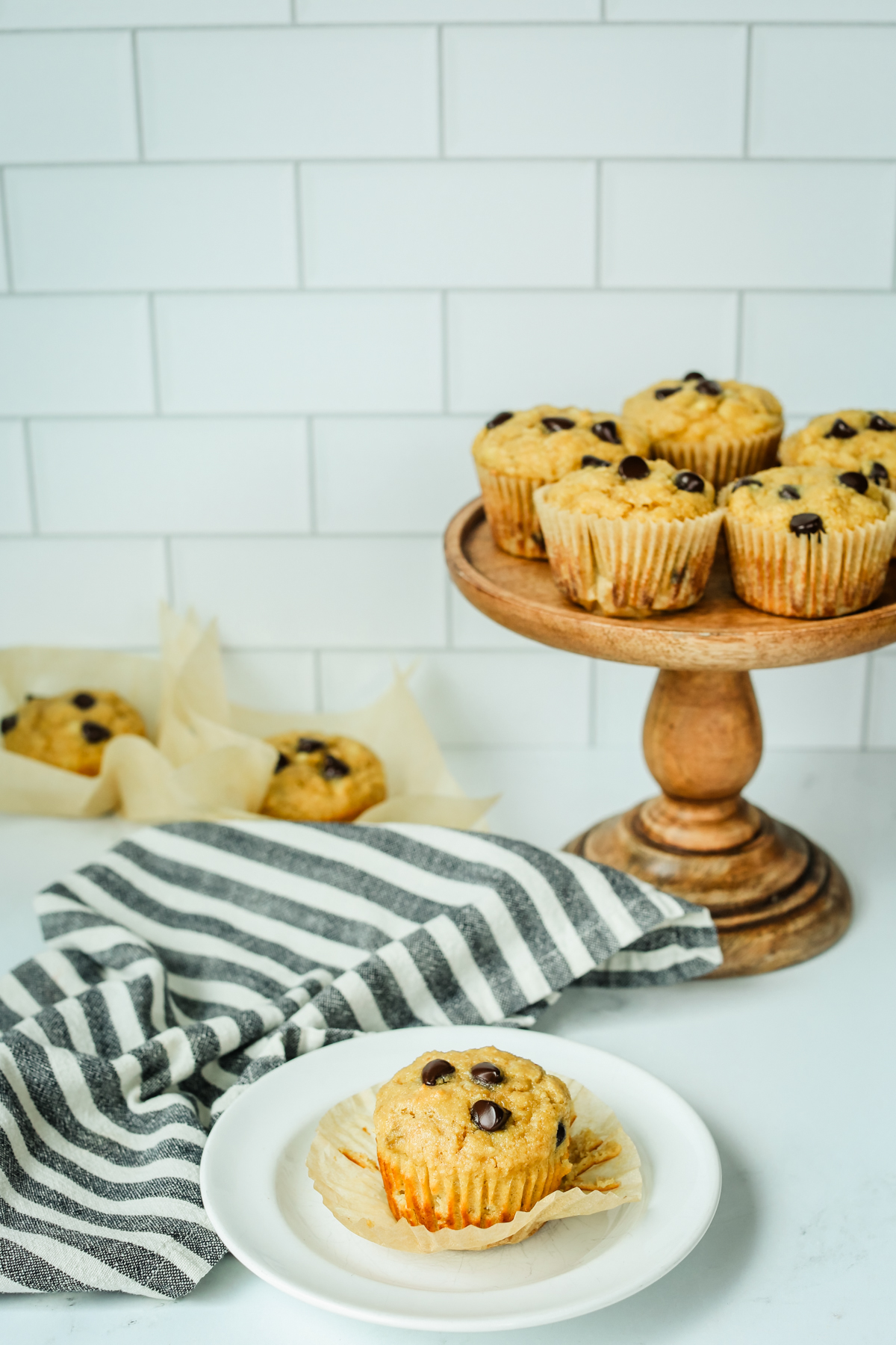 Banana protein muffins on a cake stand