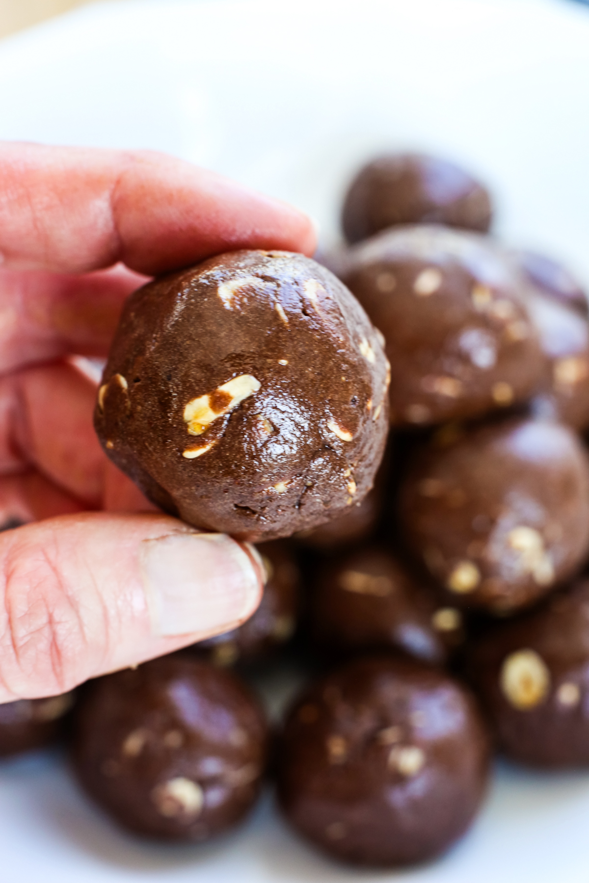 a close up shot of a chocolate protein ball