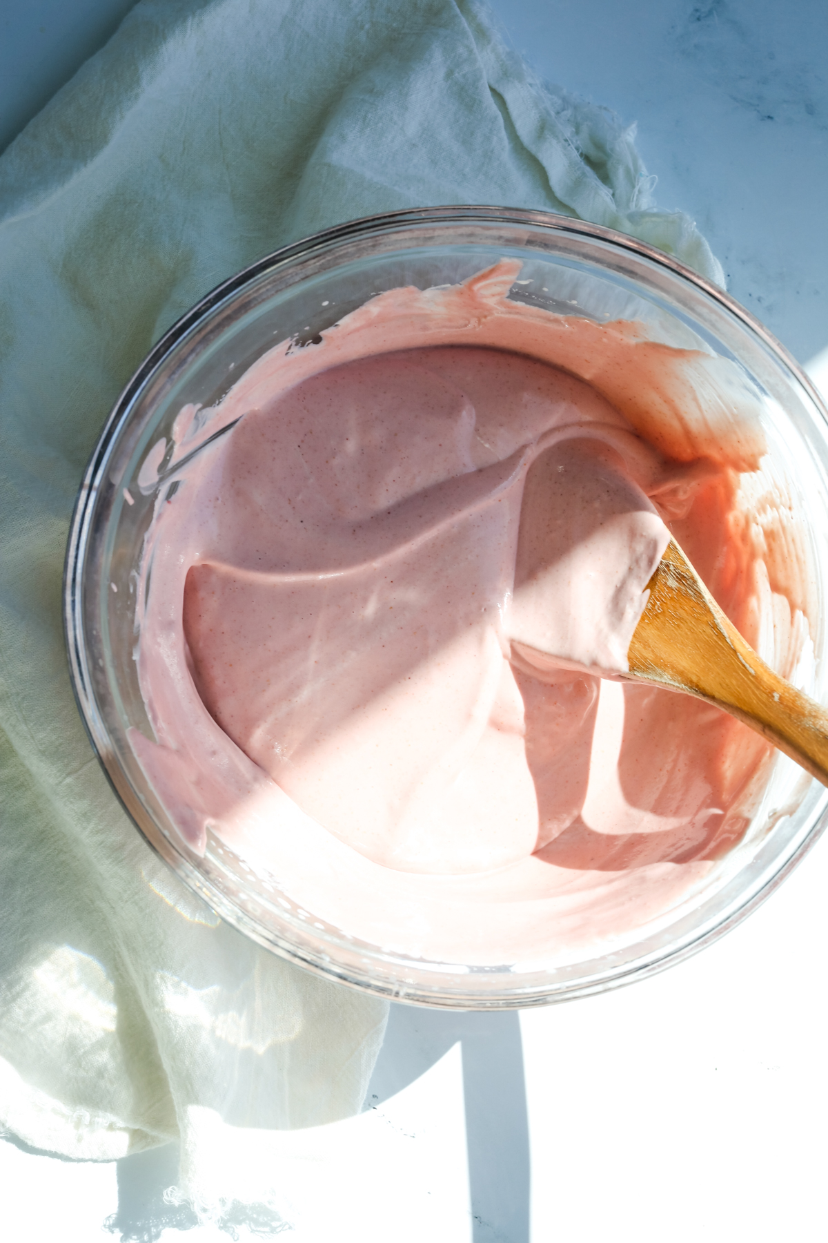 a pink fluffy mixture in a bowl