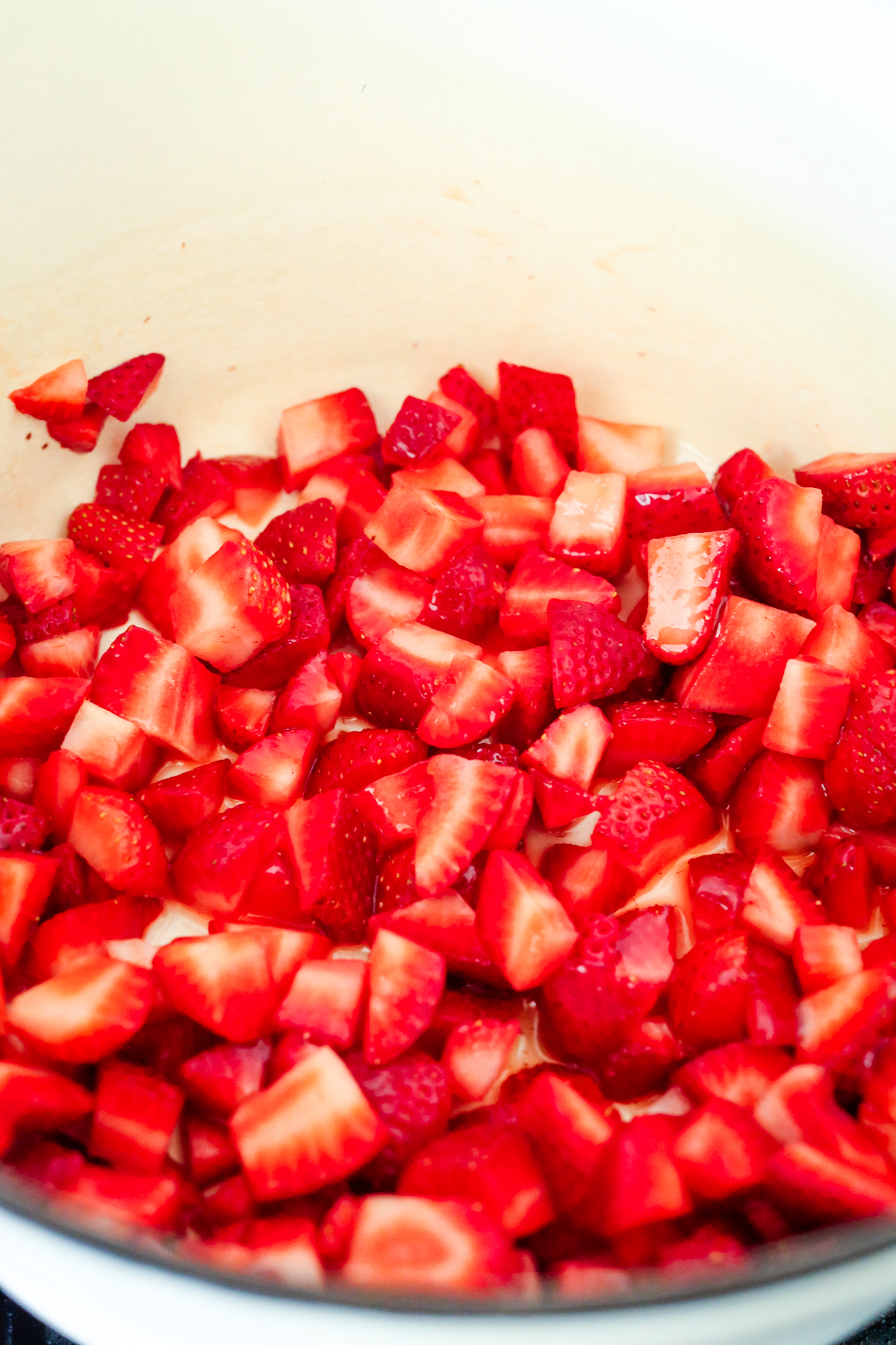 fresh strawberries, chopped, in a sauce pan