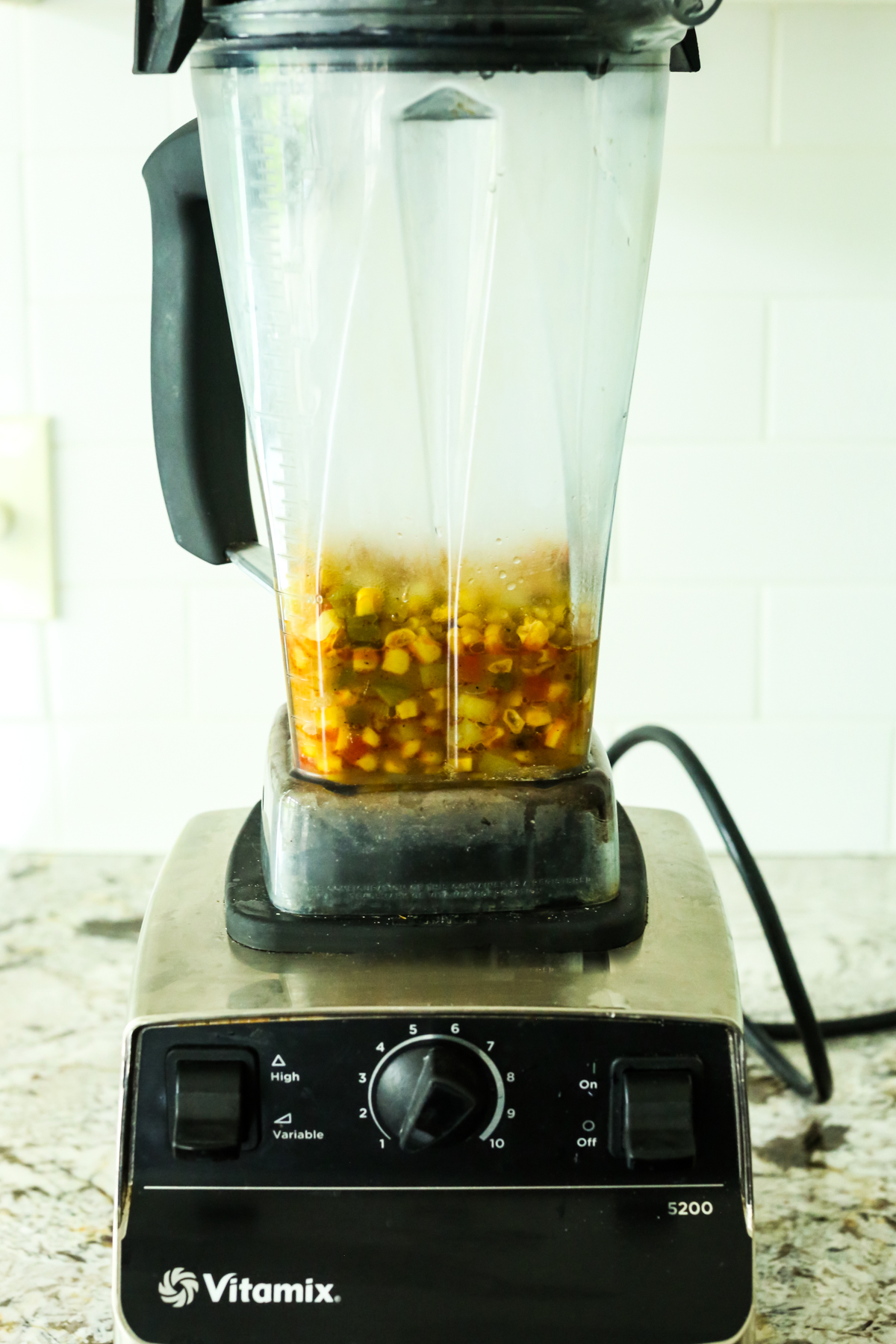 a blender with some soup ready to be blended